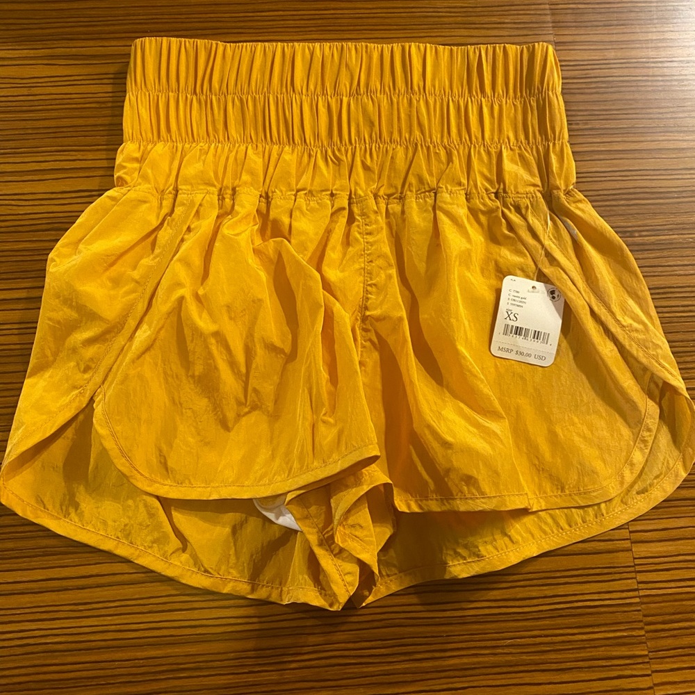Brand new with tags, free people way home shorts in color: varsity gold.